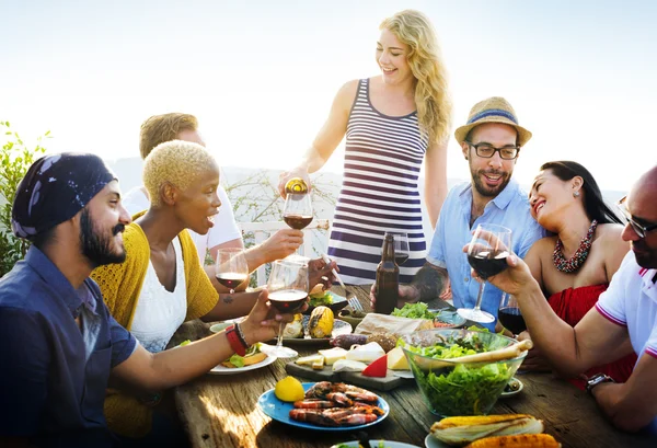 Friends hanging out at outdoors party — Stock Photo, Image