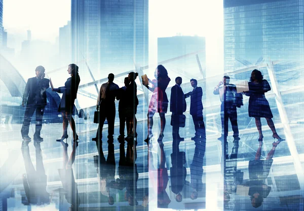 Silhouettes of business people — Stock Photo, Image