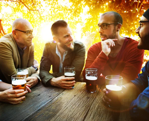 Friends hanging out at outdoors party — Stock Photo, Image