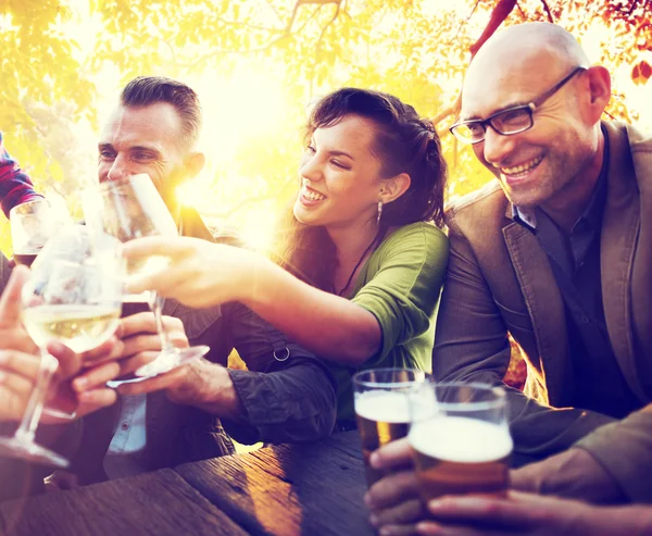 Friends hanging out at outdoors party — Stock Photo, Image