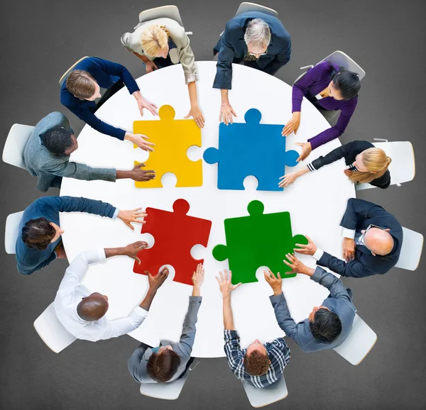 Business People and Jigsaw Puzzle — Stock Photo, Image