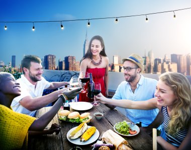 Friends Dining on  Rooftop clipart