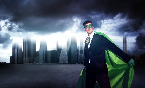 Superhero Businessman in modern city — Stock fotografie