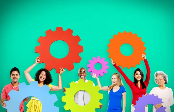 Diversity People holding Gears — Stock Photo, Image