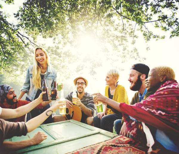 Friends hanging out at outdoors party — Stock Photo, Image