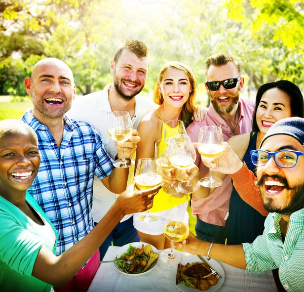 Friends hanging out at outdoors party — Stock Photo, Image