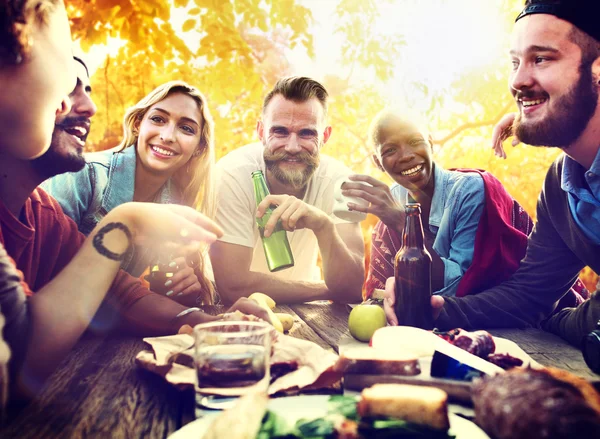 Friends hanging out at outdoors party — Stock Photo, Image