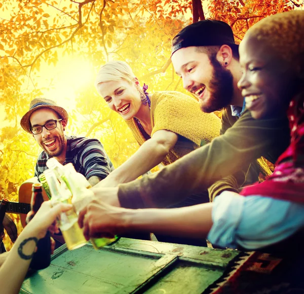 Friends hanging out at outdoors party — Stock Photo, Image