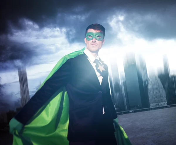 Superhero Businessman in modern city — Stock Photo, Image