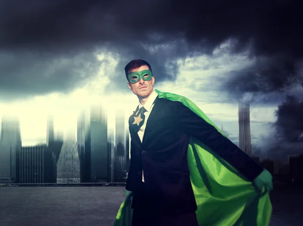 Superhero Businessman in modern city — Stock fotografie