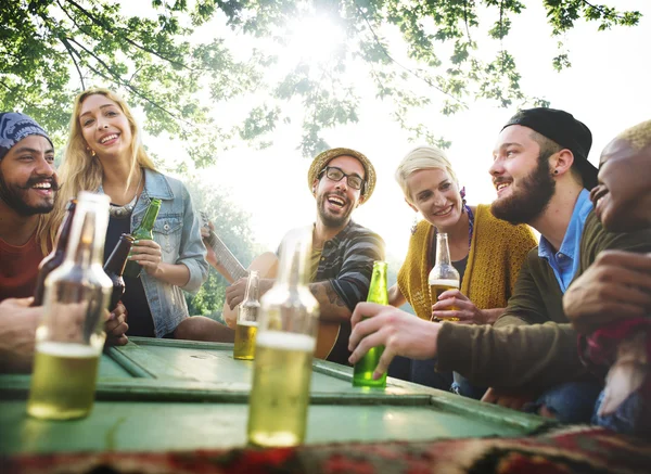 Friends hanging out at outdoors party — Stock Photo, Image