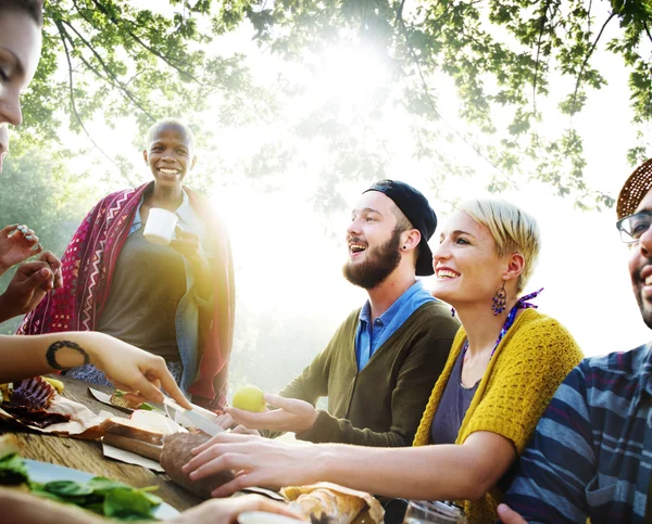 Friends hanging out at outdoors party — Stock Photo, Image