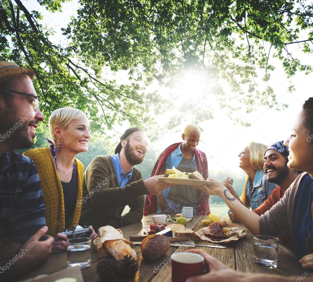 friends hanging out at outdoors party