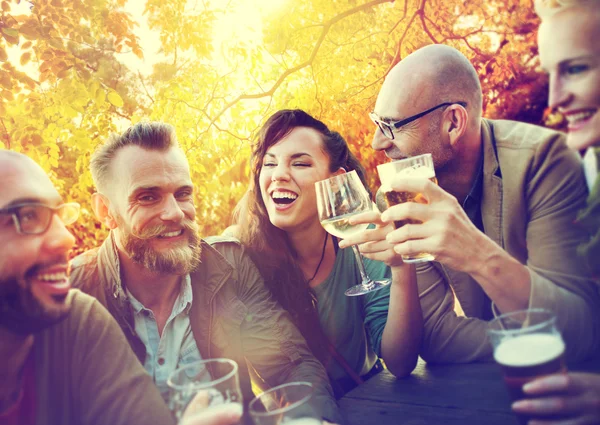 Friends hanging out at outdoors party — Stock Photo, Image