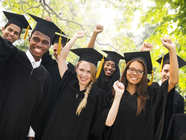 Diversity Students Celebrating Graduation Concept