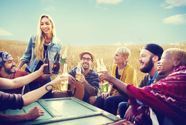 Friends hanging out at outdoors party — Stock Photo, Image