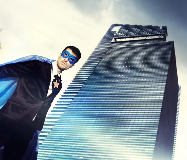 Superhero Businessman in modern city — Stock fotografie