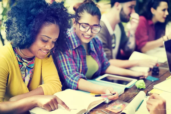 Diverse college students studying in classroom — Stock Photo, Image