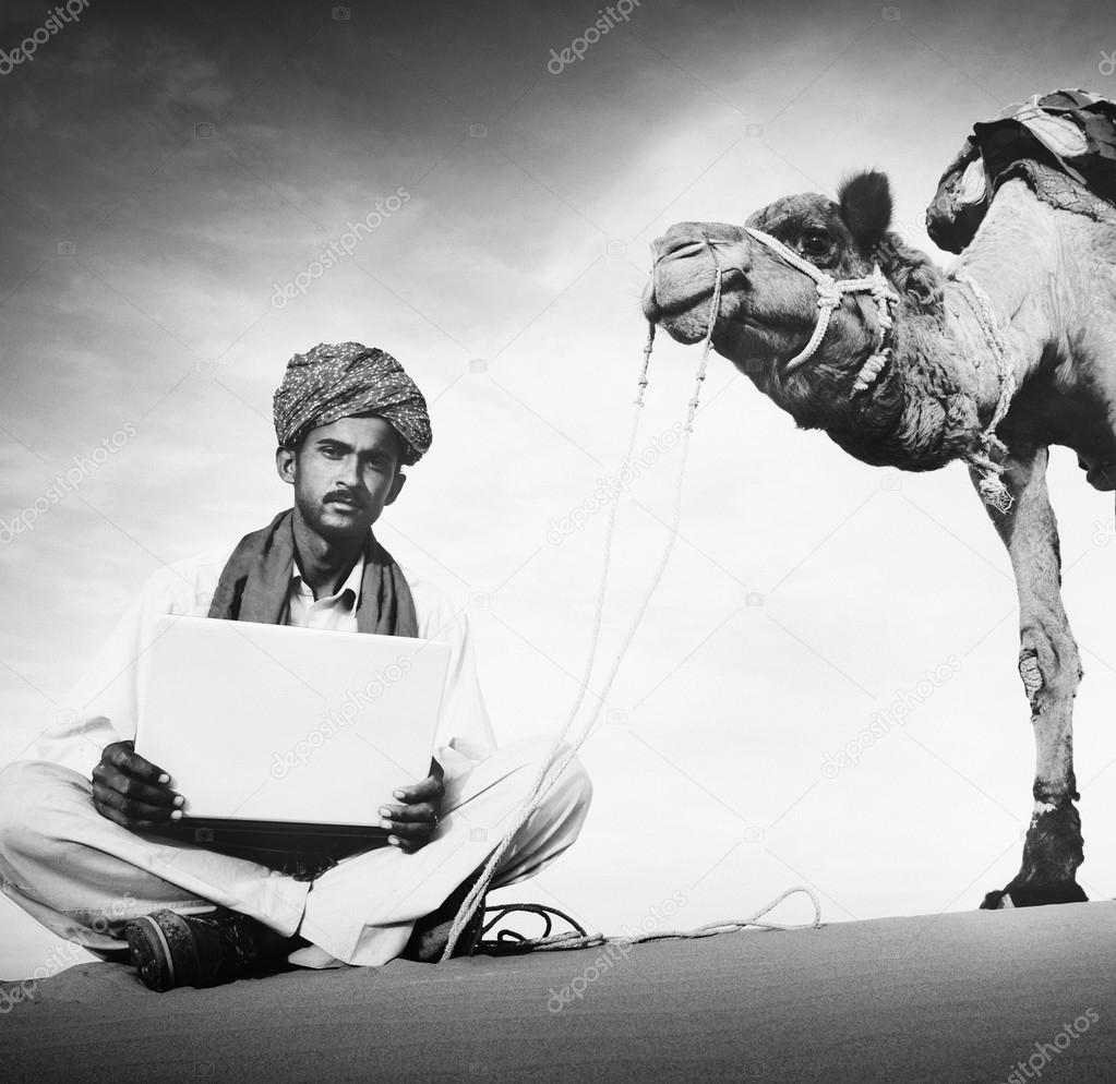 Indian Man Using Laptop 