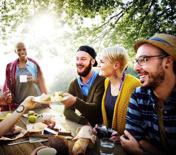 Friends hanging out at outdoors party — Stock Photo, Image