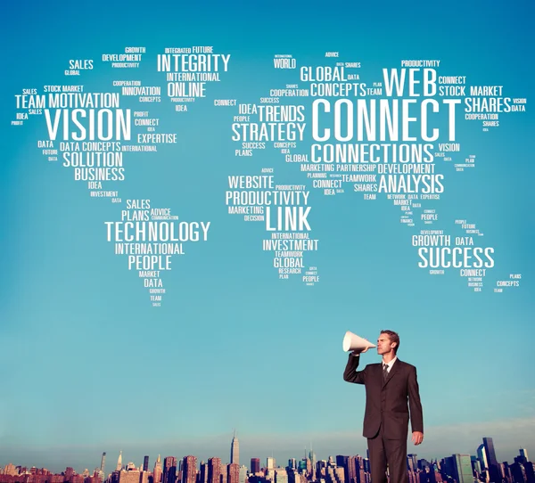 Businessman with megaphone against cityscape — Stock Photo, Image