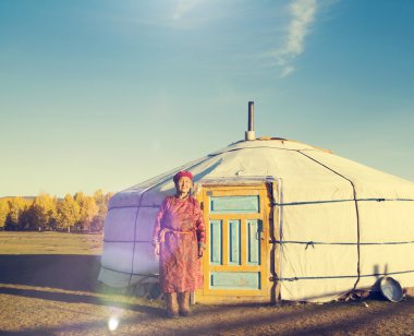 Mongolian Lady Standing at Tent Concept clipart