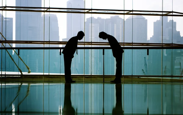 Forretningsfolk Bowing Concept - Stock-foto