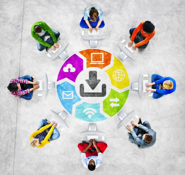 People in a Circle Using Computers — Stockfoto