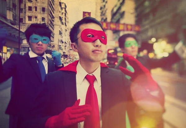 Hombres de negocios con máscaras de superhéroes — Foto de Stock