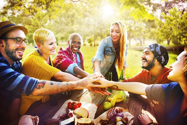 friends hanging out at outdoors party