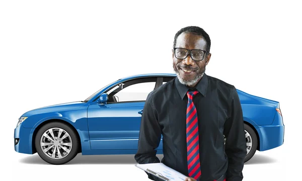 Man standing with Car behind him — Stock Photo, Image