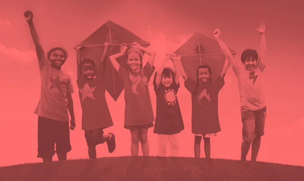 Children playing kites — Stock Photo, Image