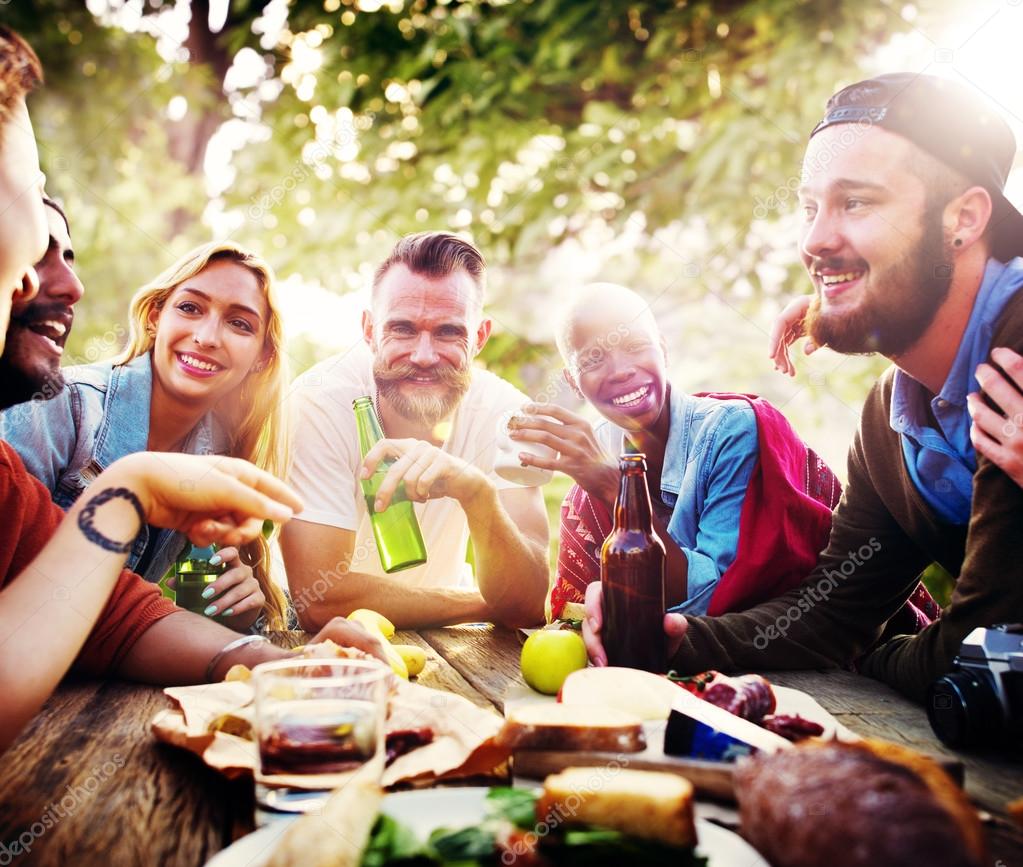 friends hanging out at outdoors party