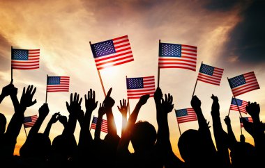People Waving American Flags clipart