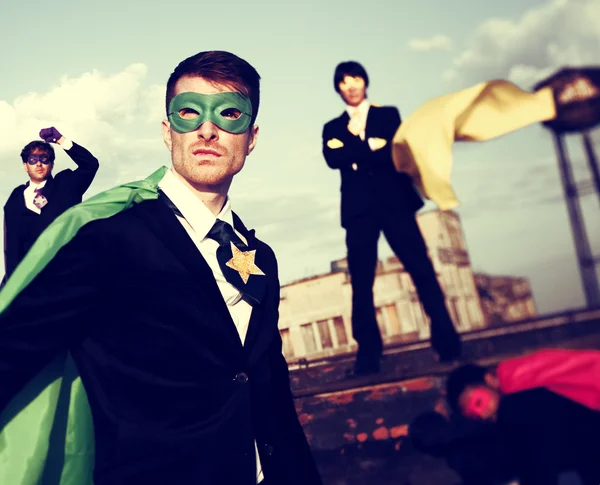 Uomini d'affari in costumi da supereroe — Foto Stock
