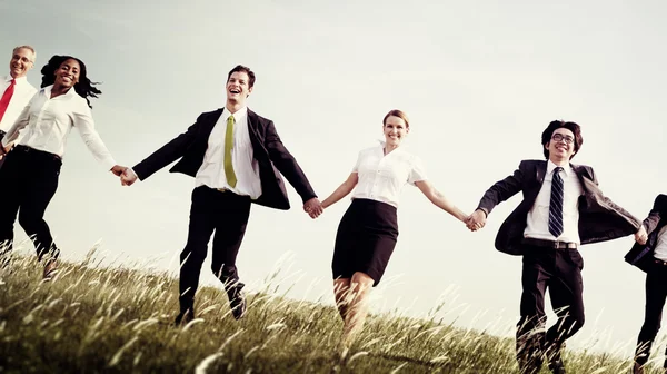 Business People holding hands — Stock Photo, Image