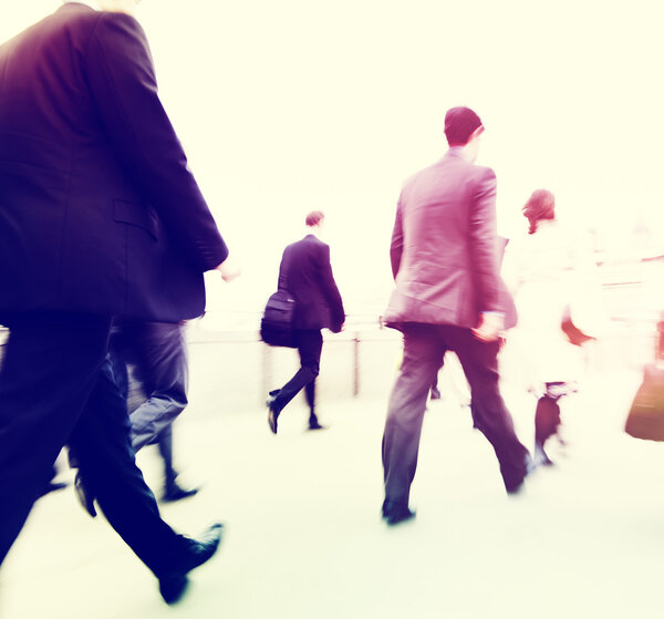 people walking across street