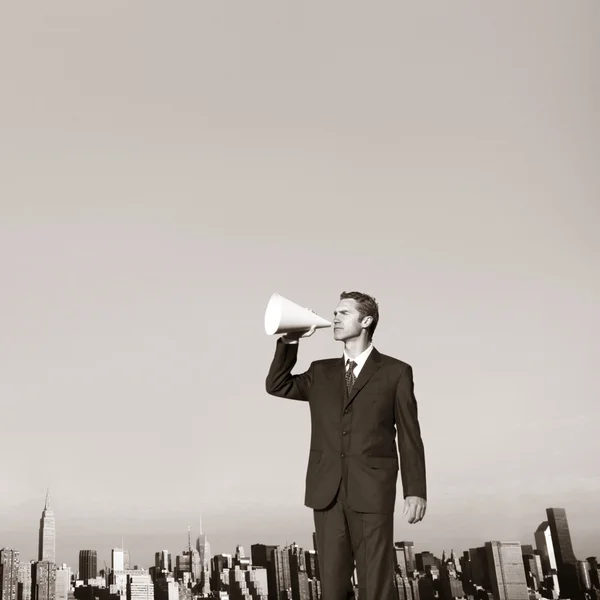 Businessman with loudspeaker Announcement — Stock Photo, Image