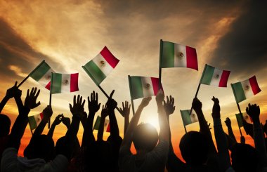 People Waving Mexican Flags clipart