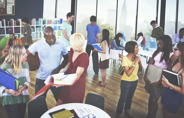 College students talking in the Classrom — Stock Photo, Image