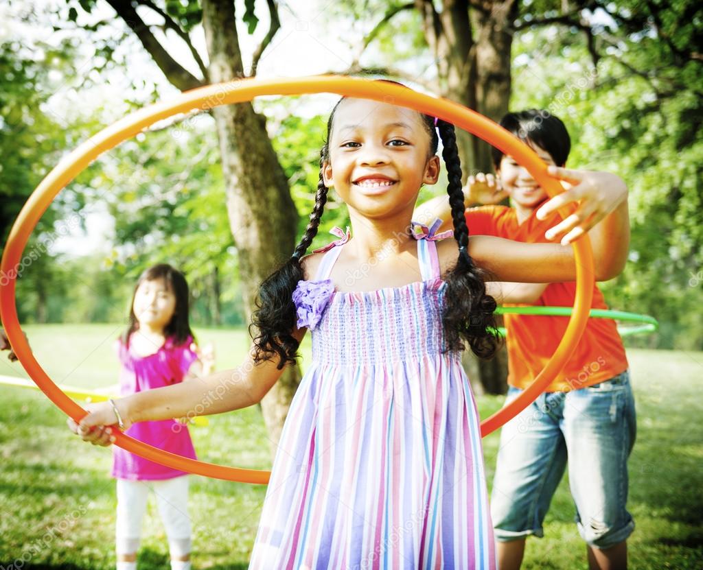 Children Playing with Hoop Concept
