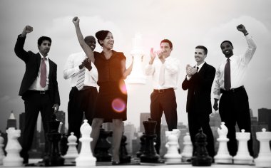 business people celebrating with chess clipart