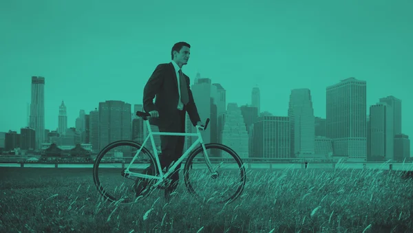 Businessman in suit with Bicycle — Stock Photo, Image