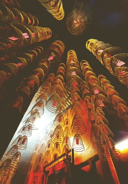 Incense coils burning in Chinese temple — Stock Photo, Image