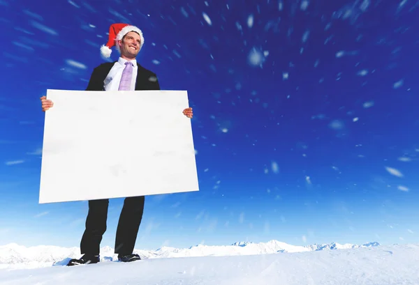 Geschäftsmann mit Weihnachtsmann-Hut — Stockfoto
