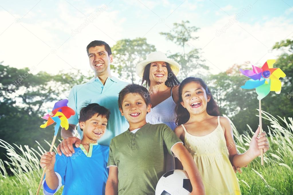 Family Playing Outdoors Concept