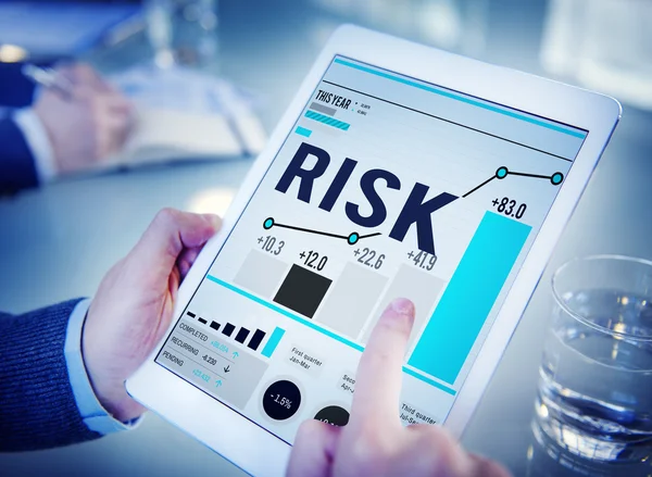 Man using tablet and Risk Concept — Stock Photo, Image