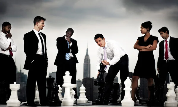Team of Business People with chess — Stockfoto