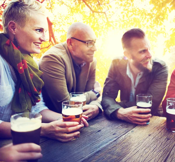 Friends hanging out at outdoors party — Stock Photo, Image