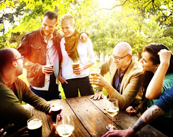 Friends hanging out at outdoors party — Stock Photo, Image